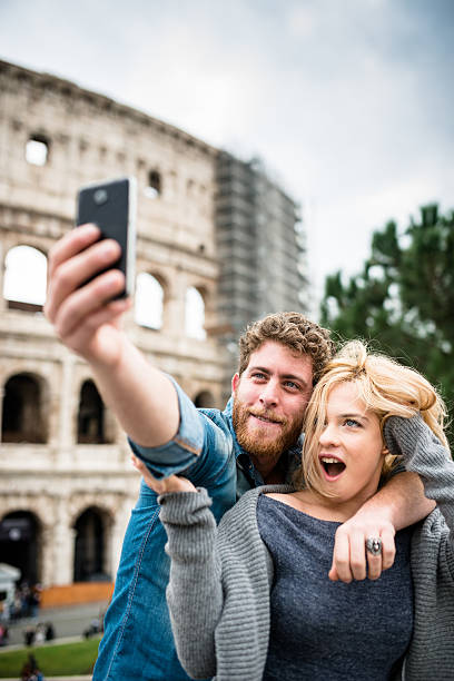 istock tourist take a self portrait on rome 545658052