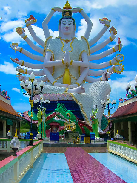 istock Wat Plai Laem temple with 18 hands God statue Guanyin 545658382