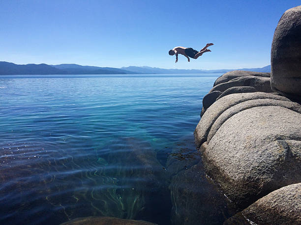 istock Man dives into Lake Tahoe in Summer 545658632