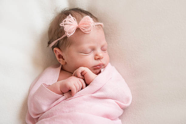 istock newborn baby sleeping closeup 545659208