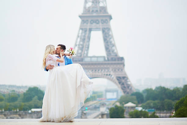 istock Just married couple near the Eiffel tower in Paris 545659462