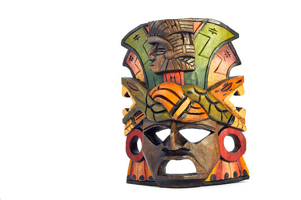 Indian Mayan Aztec wooden carved painted mask on white background