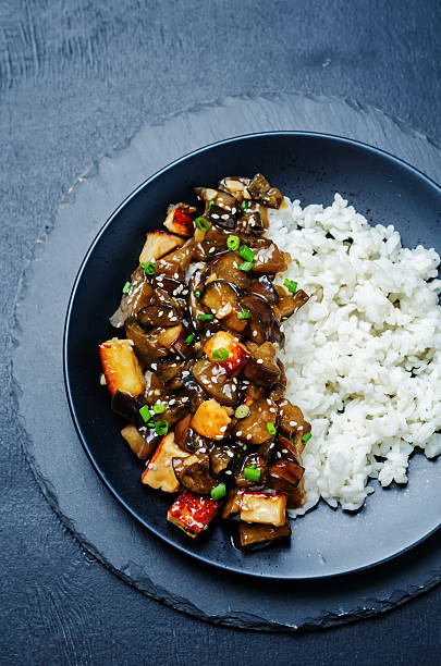 istock eggplant tofu teriyaki with rice 545660558