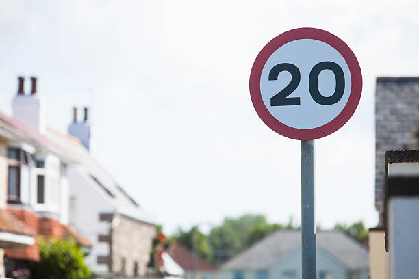 Speed restriction road sign stock photo