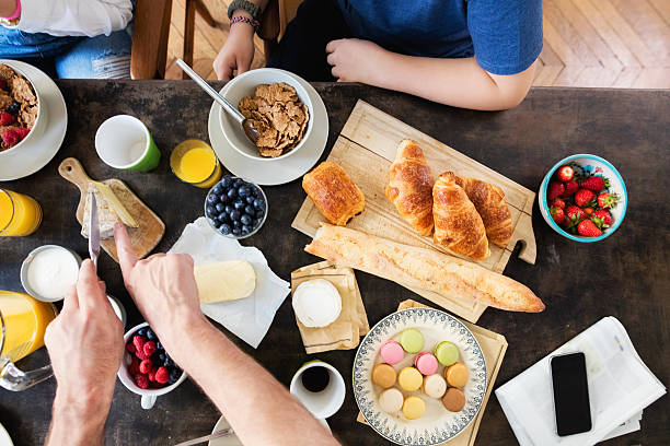istock Family Having Breakfast together, Overhead View 545662462