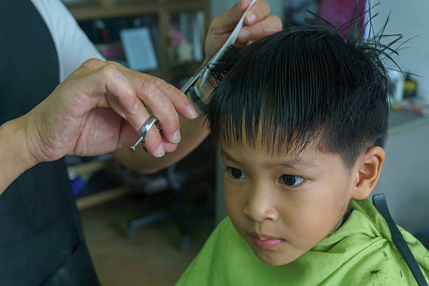 istock children hair cut 545674426