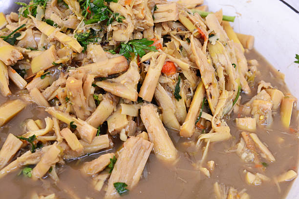 istock Thai spicy soup with bamboo shoots and herbs 545675914