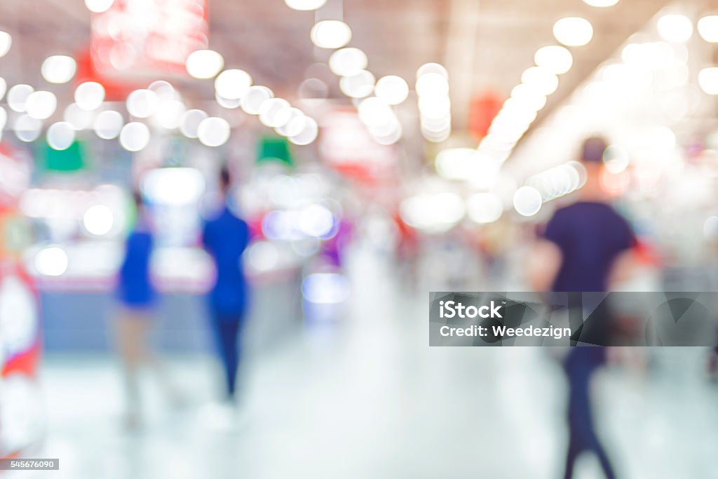 Blurred background, Customer shopping at supermarket store with Blurred background, Customer shopping at supermarket store with bokeh light. Checkout Stock Photo