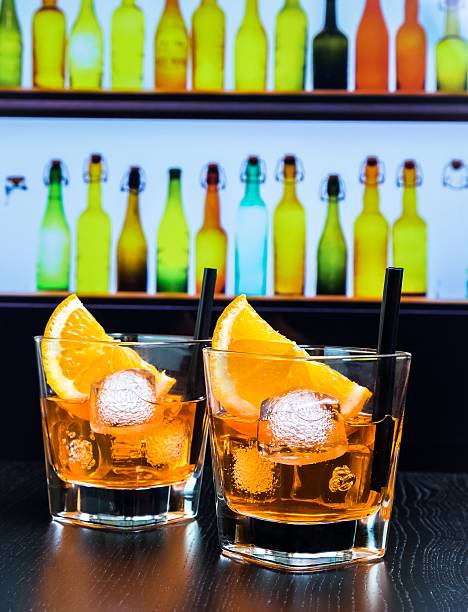 aperitif  cocktail with orange slices and ice cubes