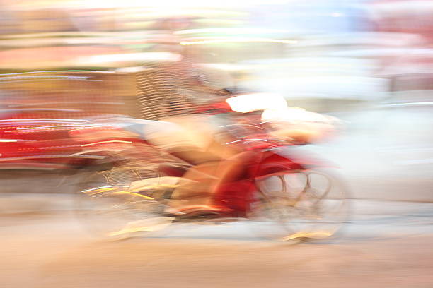 istock Street lights in speeding Motorcycle driver at night time, 545679598