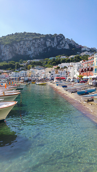 Capri, Italy - May 31, 2016: Capri Island Landscape, Marina Grande Harbor with boats and houses
