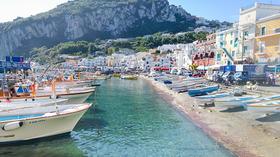 Capri, Italy - May 31, 2016: Capri Island Landscape, Marina Grande Harbor with boats and houses