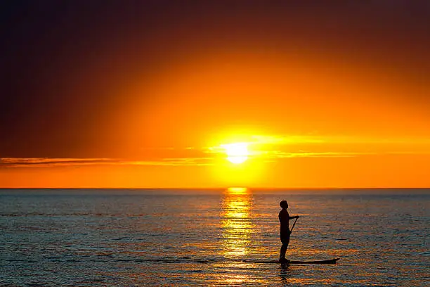 Photo of Paddle surfing man