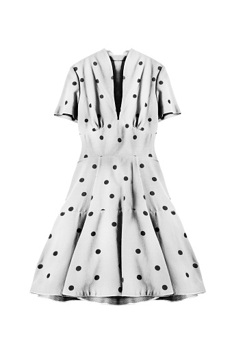 White dress with black polka dots isolated over white