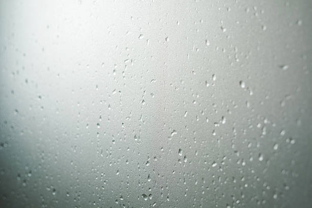 frosted glass texture with droplets, selective focus - frosted glass glass textured bathroom imagens e fotografias de stock