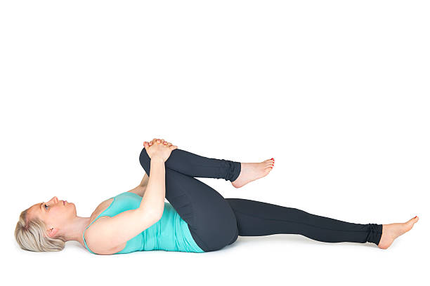 istock Yoga woman green position_34 545781482