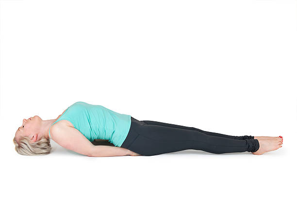 istock Yoga woman green position_54 545782348