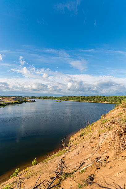 istock Blue lake and blue sky with clouds. Summer landscape. 545787814