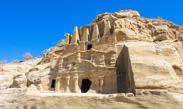 istock Petra (Raqmu) nabataeans ancient city in Jordan. Siq canyon 545789746
