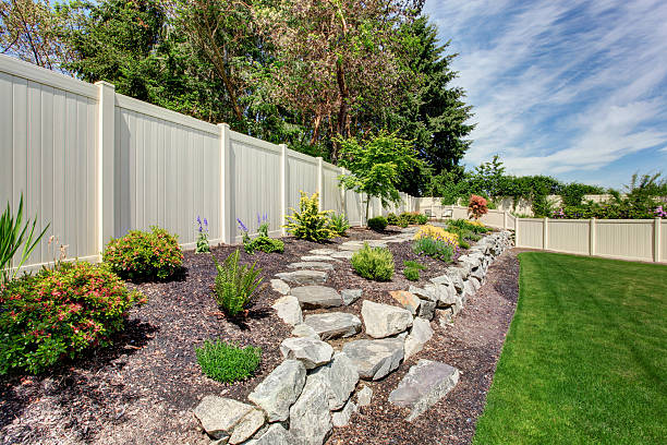 istock House with backyard patio and landscape design 545790510