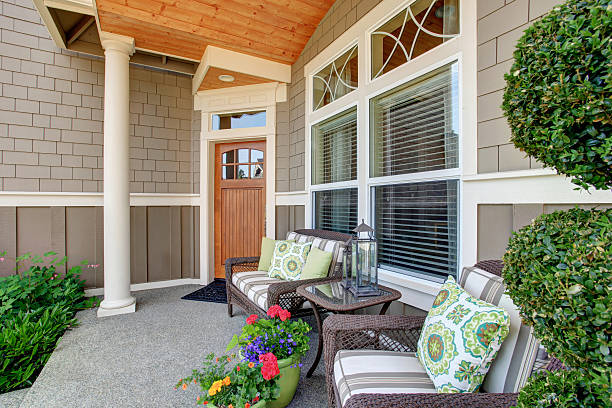 istock House with backyard patio and landscape design 545791110