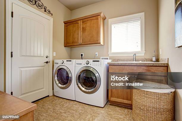 Laundry Room With Washer And Dryer Stock Photo - Download Image Now - Utility Room, Dryer, Architect