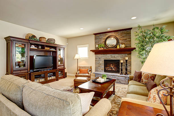 istock Spacious living room with fireplace, carpet floor and rug 545791636