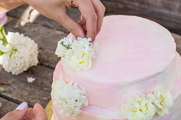 istock Process of decorations of big pink wedding cake 545791894
