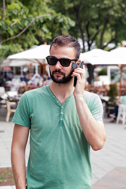 istock Portrait of a handsome man having phone conversation 545791960