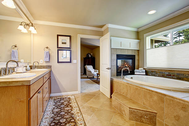 istock Classic American bathroom with wooden cabinets, two white sinks 545792712