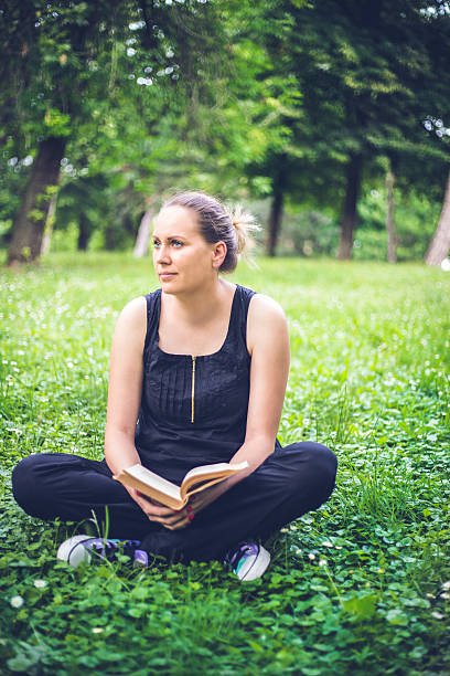 istock Beautiful Girl with a book 545796246