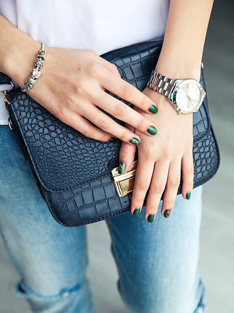 istock Modern girl with green nail Polish 545798178