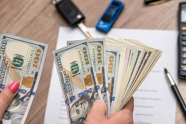istock car contract form with money, pen, key 545799332