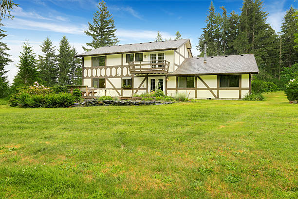 istock Farm house backyard with green lawn 545800678
