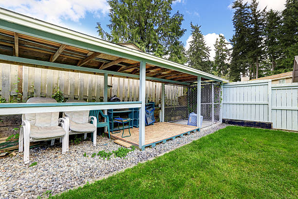 istock Covered patio area with outside chairs in the backyard garden. 545801898