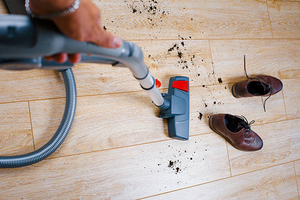 istock clean floor with a vacuum cleaner at home 545802134