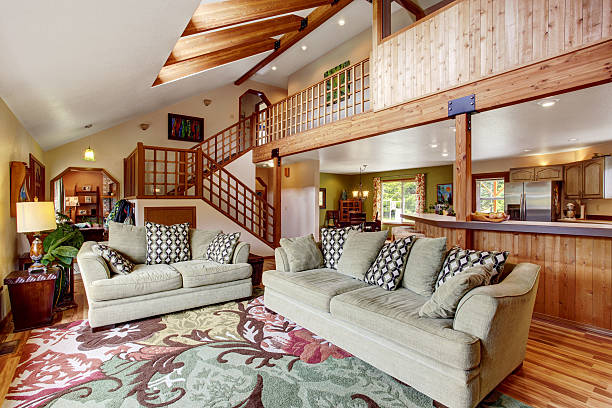 istock Light living room with hardwood floor and high ceiling 545806356