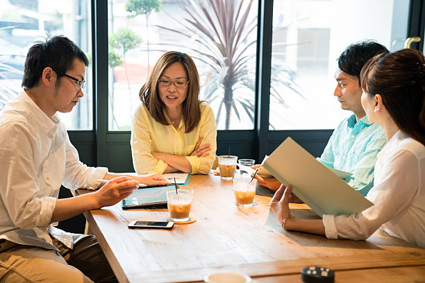 istock Female executive holding a business meeting 545806910