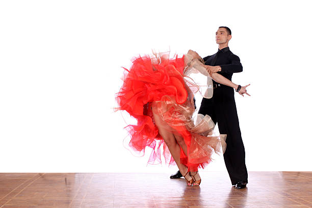 istock Latino dancers in ballroom against white background 545808120