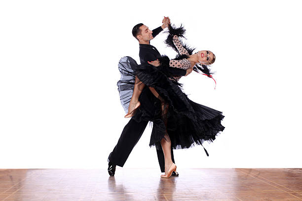 istock Latino dancers in ballroom against white background 545808212