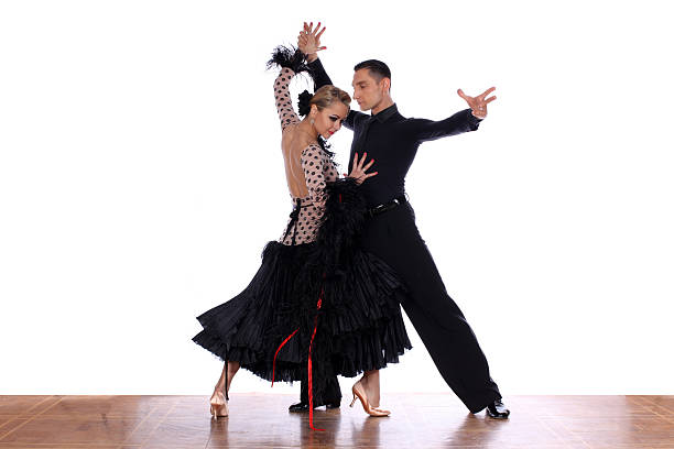istock Latino dancers in ballroom against white background 545808234