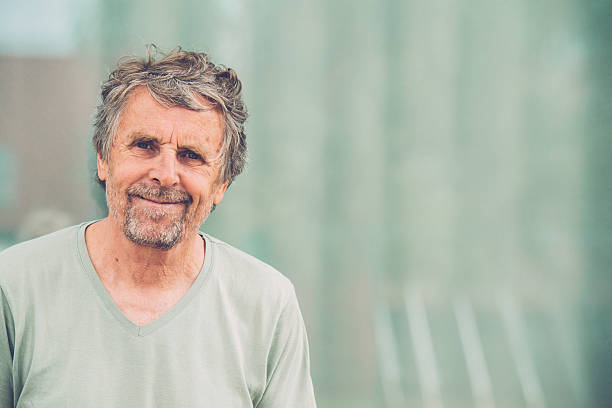 istock Senior man with beard and gray hair portrait 545809780