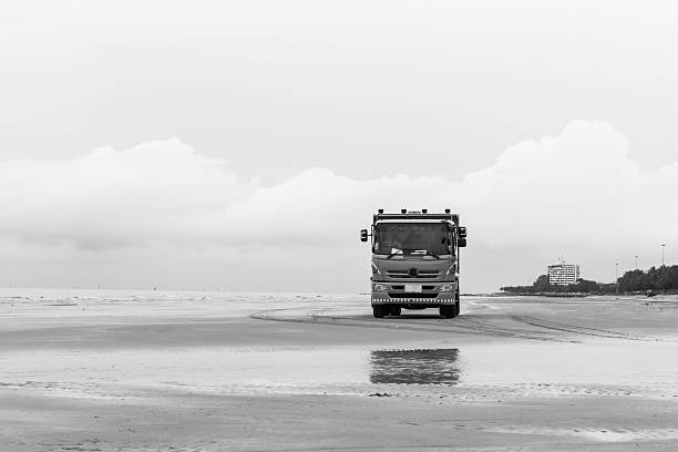 istock Truck on the beach with black and white 545810498