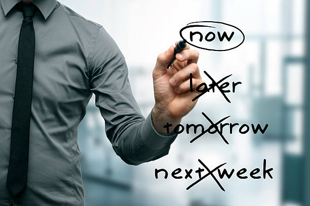 no procrastination - do it now no procrastination concept - do it now urgency stock pictures, royalty-free photos & images