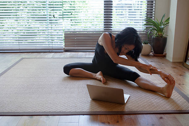 istock japanese female doing physical relaxation exercise  in kyoto japan 545813210