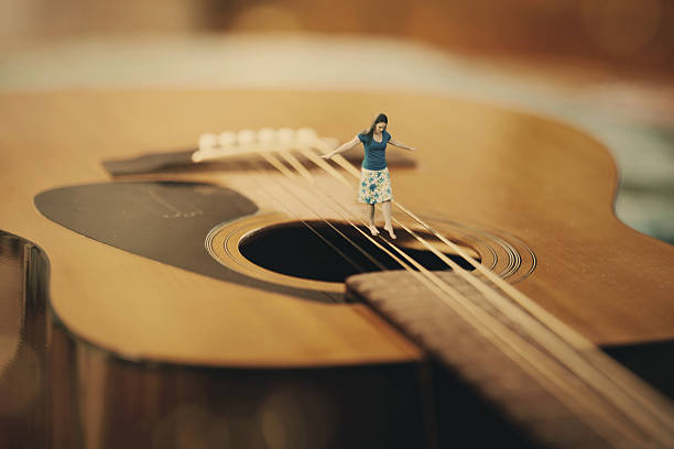 istock Woman on a guitar 545815784