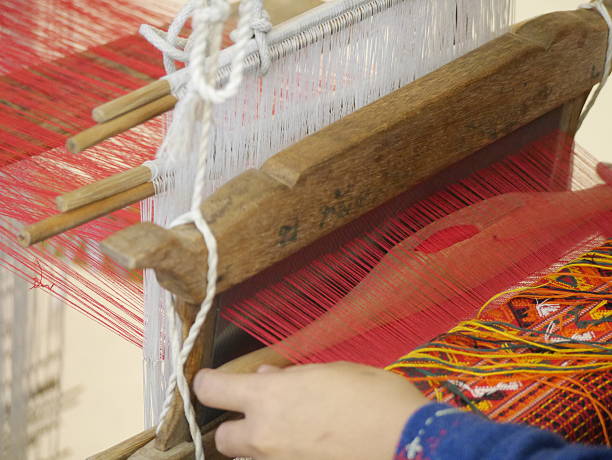 istock weaving thread to become the cotton fabric cloth 545816270
