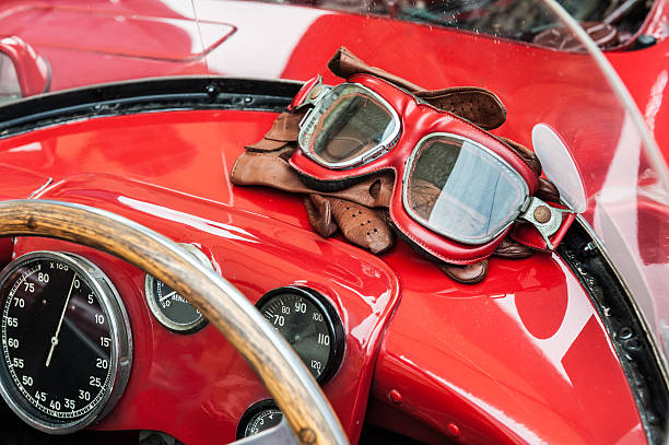 istock Glasses and gloves inside a vintage red car 545816436