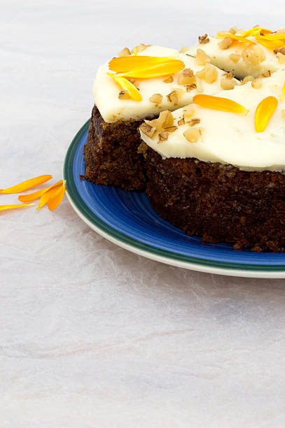 istock Carrot and marigold cake. Close up. Copy space. 545817992