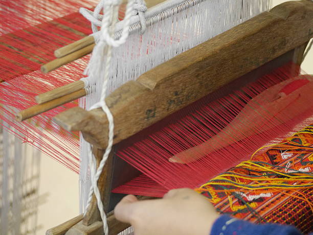 istock weaving thread to become the cotton fabric cloth 545818880